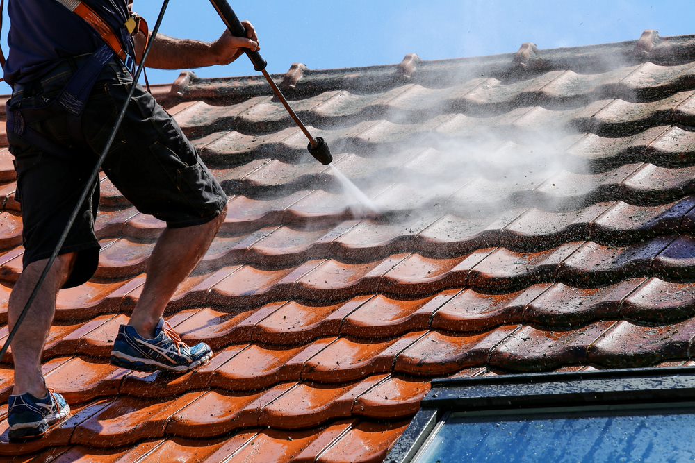 Faded concrete roof tiles before repainting